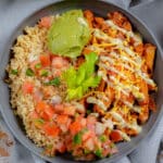 pork tenderloin burrito bowl with avocado, pico de Gallo and rice