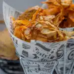 Potato peel chips in a paper cone