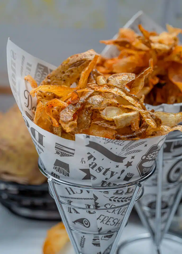 Potato peel chips in a paper cone