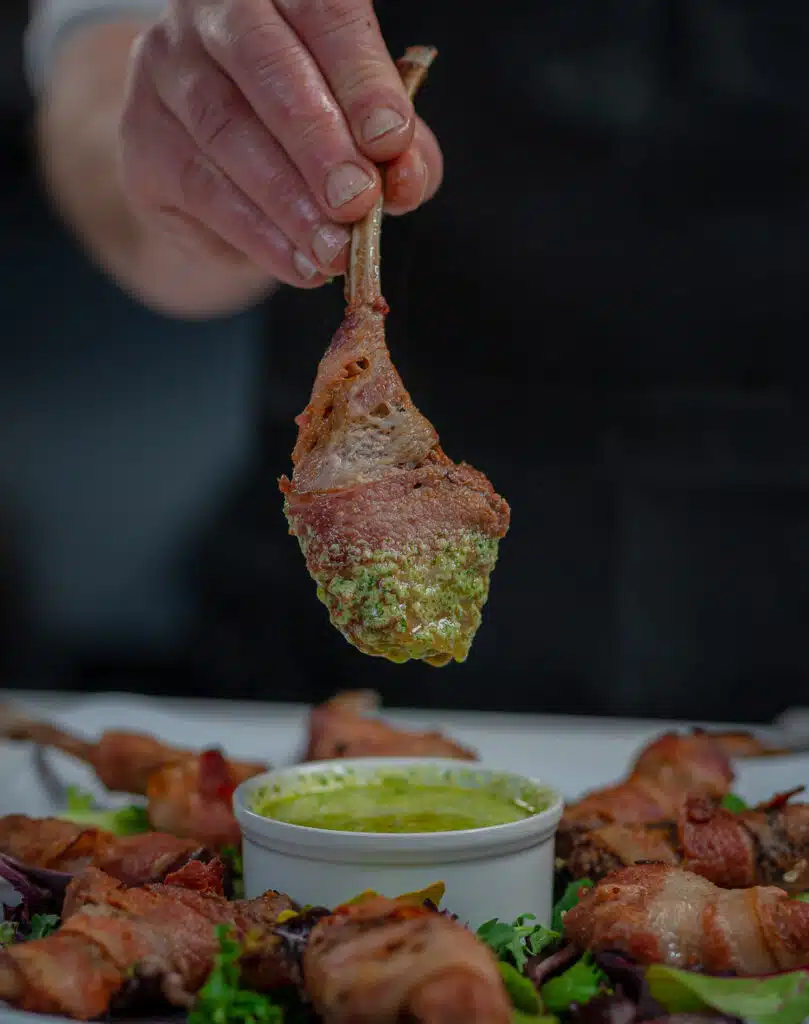lamb chop dipped in salsa verde
