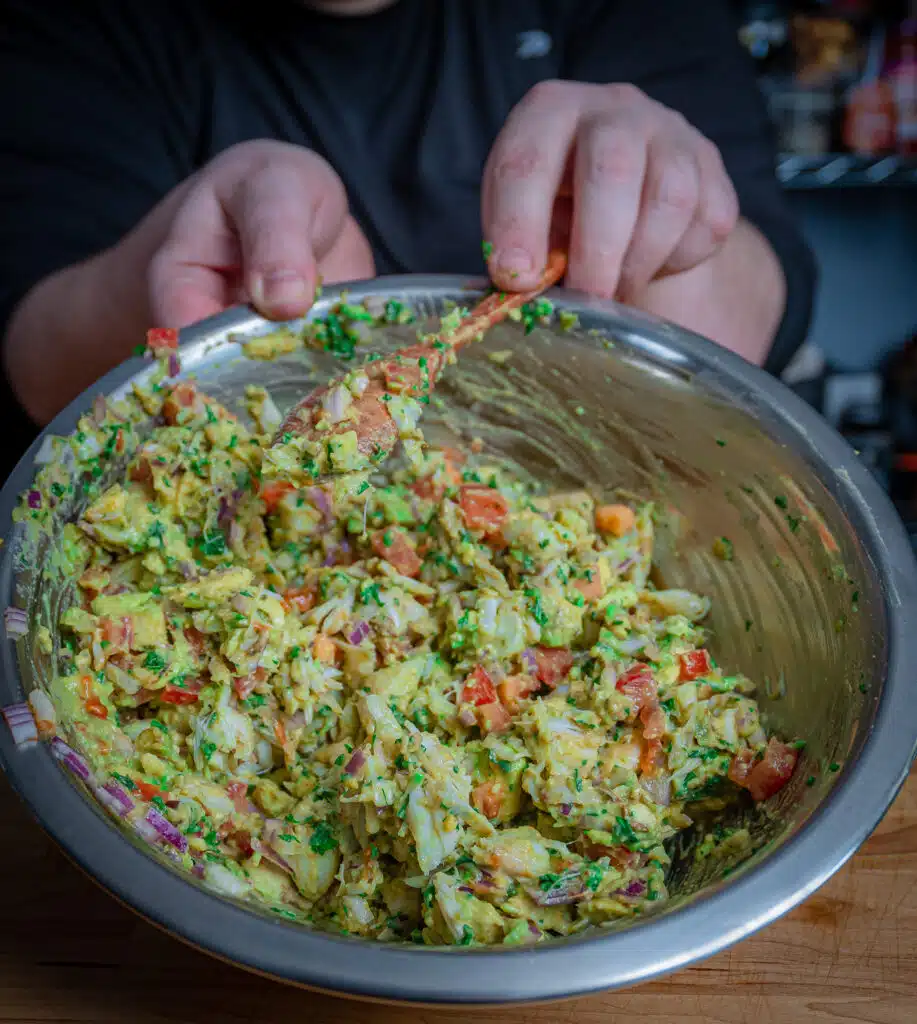 Crab guacamole with jumbo lump crab in a bowl