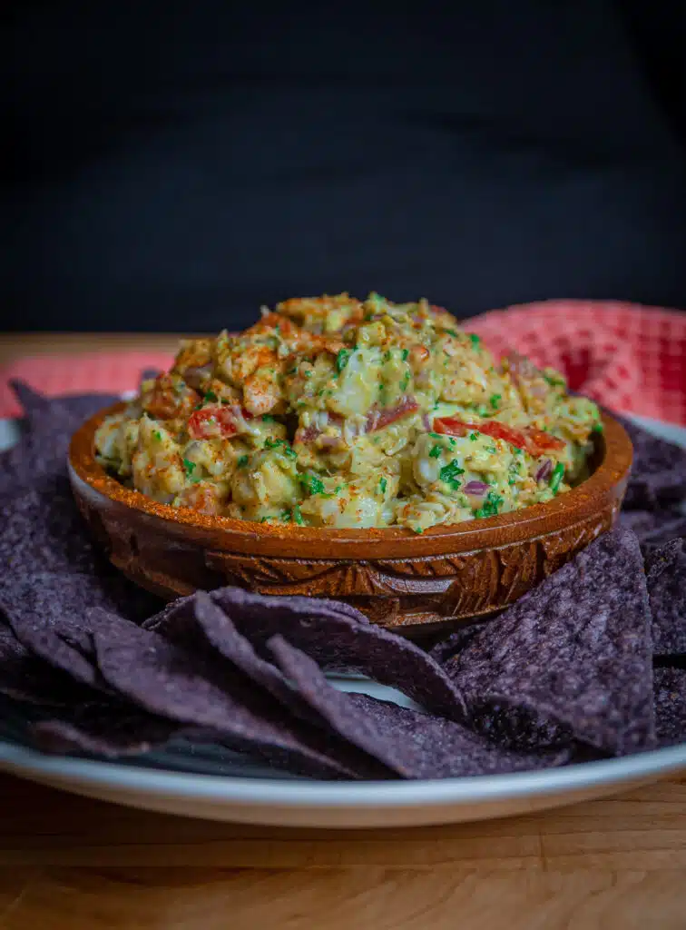 Crab guacamole served with blue corn tortillas chips