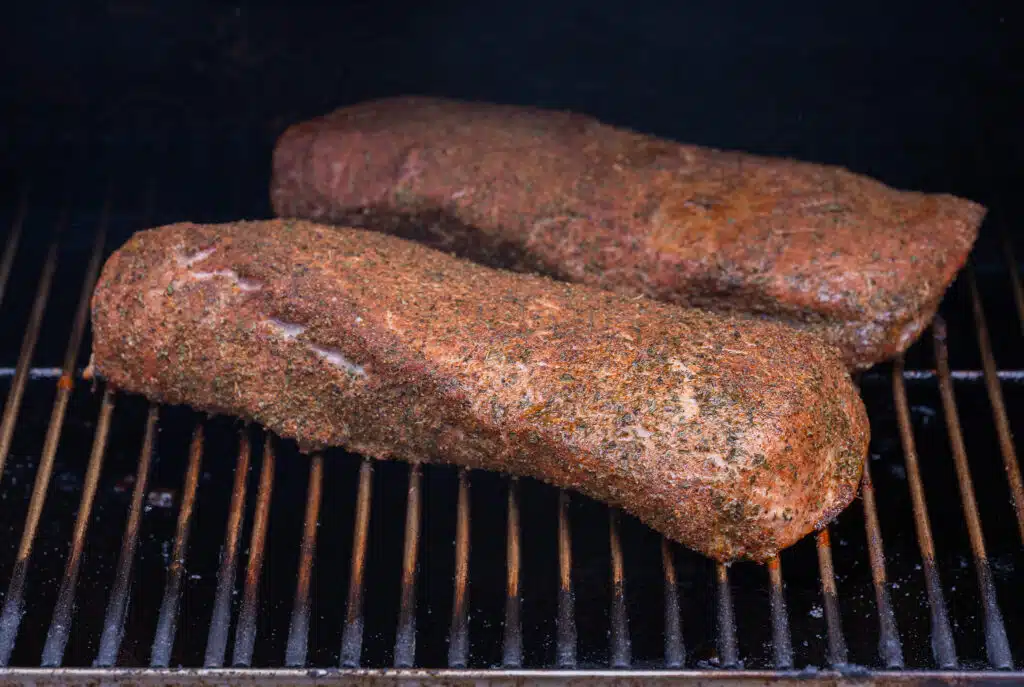 Pork loins smoking on the pellet grill