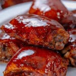 Smoked chicken thighs smothered in bbq sauce