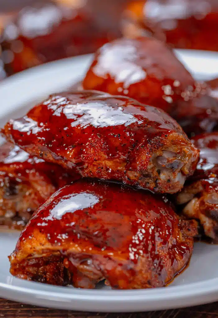 Smoked chicken thighs smothered in bbq sauce