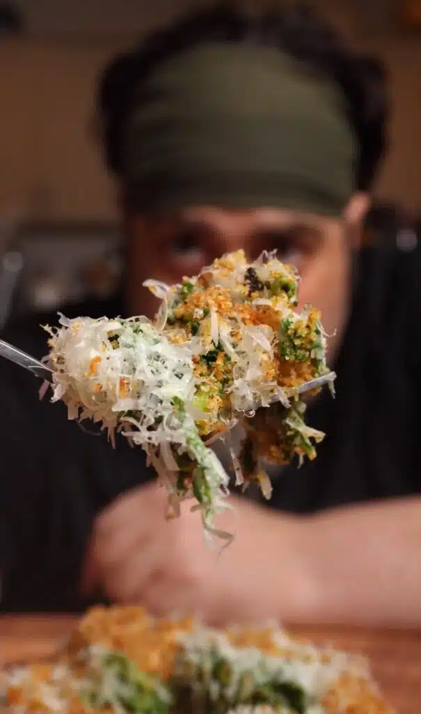 a fork full of Kale Caesar salad