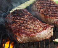 Grilling Costco Ribeye Steaks on a Charcoal Grill