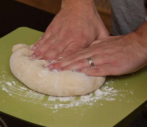 Kneading a hotdog bun dough