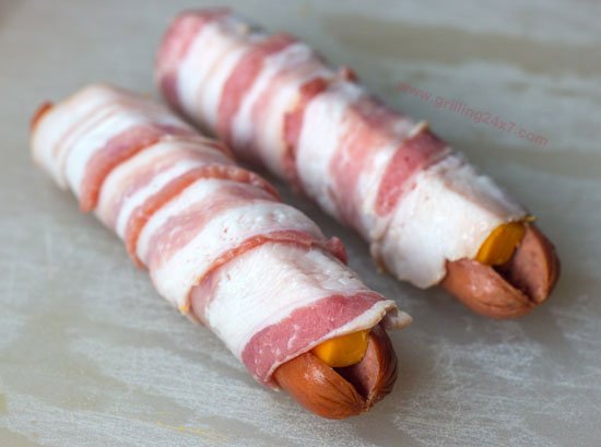 Bacon wrapped cheddar stuffed hotdogs