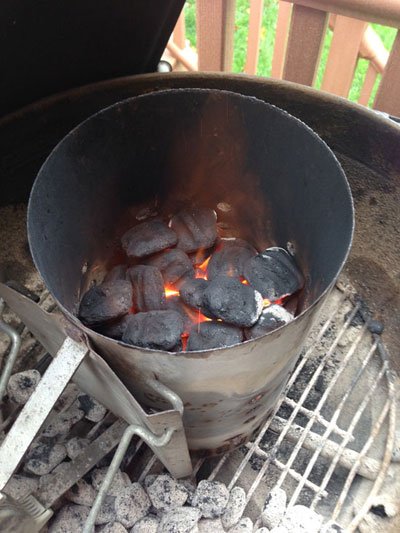 How to light a pit barrel cooker using charcoal and lighter fluid or a charcoal chimney - grilling24x7.com