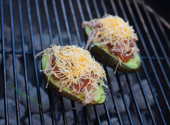 Grilled stuffed avocado recipe with pulled pork, salsa and cheese - Grilling24x7.com